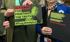Signs protesting against the imprisonment of Hong Kong activist Jimmy Lai.