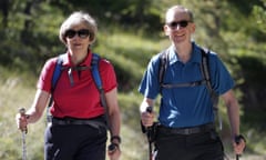 Britain's Prime Minister Theresa May walks in a forest with her husband Philip at the start of a summer holiday in the Alps, in Switzerland<br>Britain's Prime Minister Theresa May walks in a forest with her husband Philip at the start of a summer holiday, as they pose for photographers, in the Alps, in Switzerland August 12, 2016. REUTERS/Marco Bertorello/Pool