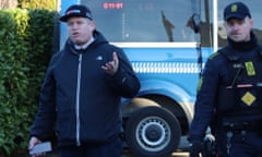 Rasmus Paludan, a far-right Danish politician is being protected by Danish policemen as he makes a statement before burning a copy of the Quran in front of Turkish Embassy in Copenhagen, Denmark on January 27, 2022