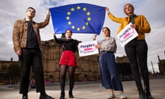 Edinburgh university students holding EU flag: Andrew Wilson (president) leopard print; Oona Miller (vice president) black top red skirt; Rosheen Wallace (vice president community) blue trousers; Stephanie Vallency (vice president education) yellow jacket