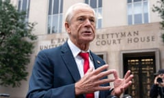 man in a suit outside a courthouse