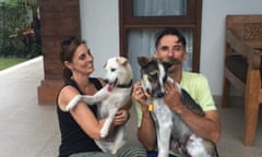 Danielle and Anthony Hayes with their rescue dogs in Bali in 2017