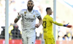 Karim Benzema runs off to celebrate.