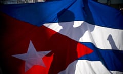 A child holds a Cuban flag marking the 59th anniversary of the arrival of Fidel Castro an his rebel army in Regla, outskirts of Havana, Cuba, Monday, Jan. 8, 2018. Castro and his rebels arrived in Havana via caravan on Jan. 8, 1959, after toppling dictator Fulgencio Batista. (AP Photo/Ramon Espinosa)