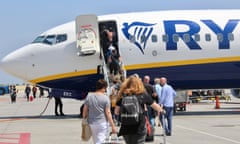 Passengers board a Ryanair flight in Athens