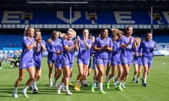 Everton players applaud supporters during an open training session at Goodison Park last month.