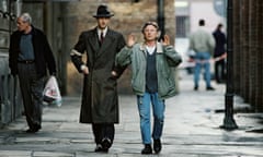 Roman Polanski directs Adrien Brody in The Pianist (2002), set in the Warsaw ghetto