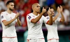 Tunisia's Wahbi Khazri and teammates salute their fans after the match.