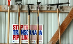 Various anti-pipeline signs line the walls of the machine shed of Art and Helen Tanderup, who are against the proposed Keystone XL Pipeline that would cut through the farm where they live near Neligh, Nebraska, U.S. April 12, 2017. Picture taken April 12, 2017.  REUTERS/Lane Hickenbottom