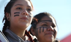 Idle No More Protests<br>WINDSOR ON - JANUARY 16: Brittany Albert and Tayah Doxtator watch traffic as "Idle no more" protesters rally at the base of the Ambassador Bridge between Windsor and the United States. at in Windsor. January 16, 2013 STEVE RUSSELL/TORONTO STAR (Steve Russell/Toronto Star via Getty Images)