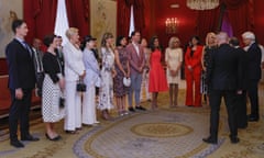 Nato leaders’ spouses including Gauthier Destenay (centre), husband of Luxembourg’s PM, in Madrid.