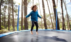 Girl jumping on trampoline