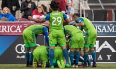 Jordan Morris is swamped by team-mates after sending the Sounders through to the MLS Cup