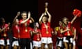 Spain coach Jorge Vilda alongside players Ivana Andrés and Olga Carmona at the trophy parade in Madrid.