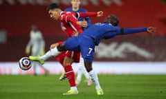 N’Golo Kanté stretches to try to dispossess Liverpool’s Roberto Firminho during Chelsea’s win at Anfield on Thursday.