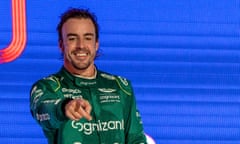 Fernando Alonso celebrates on the podium in Jeddah
