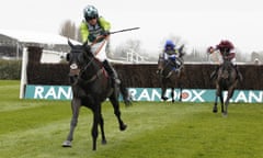 Clan Des Obeaux, ridden by Harry Cobden, wins the Betway Bowl Chase at Aintree