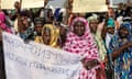 Hundreds march through streets of Banjul in the Gambia in support of bill that would repeal a ban on female genital mutilation