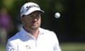 Graeme McDowell, of Northern Ireland, tosses his ball to his caddie after hitting onto the ninth green during the first round of the Arnold Palmer Invitational golf tournament Thursday, March 7, 2019, in Orlando, Fla. (AP Photo/Phelan M. Ebenhack)