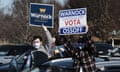 Supporters rally for Democratic Senate candidates Jon Ossoff and Raphael Warnock on 14 December. 