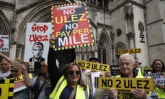 Anti ULEZ demonstrators protest outside the High Court in London. They are opposed to the proposed ULEZ (Ultra Low Emission Zone) expansion.