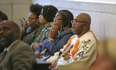 Sam Johnson, right, father of the late Samuel DuBose, sits in the courtroom for the start of the jury selection process for Ray Tensing’s murder trial.