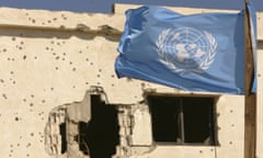 A UN flag placed by Ghanian peacekeepers with the United Nations Interim Forces in Lebanon (UNIFIL) flutters amid the rubble of the Lebanese-Israeli border town of Maroun al-Ras 27 August 2006, which witnessed fierce battles between Israeli troops and Hezbollah militants. UN chief Kofi Annan will arrive in Beirut tomorrow to discuss with Lebanese officials the deployment of a beefed up UN peacekeeping force as well as measures to secure the border with Syria.