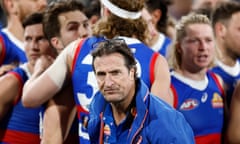 Luke Beveridge in front of Bulldogs player after their final-round win over Geelong