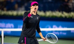 Iga Swiatek celebrates scoring a point over Qinwen Zheng on day 5 of the Dubai Duty Free Tennis Championships