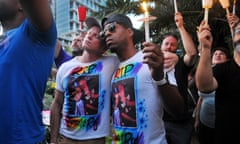 LAKE ELOA VIGIL PULSE VICTIMS<br>Bryan Manley and Greg Mitchell, both of Orlando, Fla., who lost their best friend in the Pulse nightclub shooting, join a candlelight vigil at Lake Eola Park in Orlando, Fla., Sunday, June 19, 2016. (Craig Rubadoux/Florida Today via AP) MANDATORY CREDIT