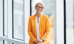 Emma Walmsley smiles as she sits by a window