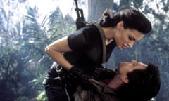 The definition of perfection … Famke Janssen as Xenia Onatopp with Pierce Brosnan as James Bond in Goldeneye (1995).