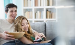 Couple watching TV together