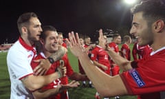 Gibraltar-Liechtenstein<br>epa07098558 Gibraltar's player George Cabrera (2-L) celebrates with teammates their victory against Liechtenstein at the end of the UEFA Nations League soccer match between Gibraltar and Liechtenstein played at the Victoria Stadium in Gibraltar, 16 October 2018.  EPA/A. Carrasco Ragel