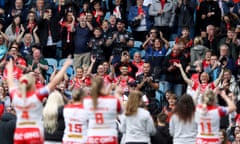 St Helens celebrate with their fans after beating Leeds in the 2022 grand final.