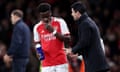 Mikel Arteta and Bukayo Saka