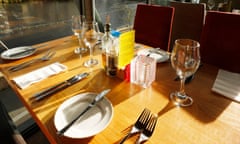 A table laid at a restaurant in readiness for customers