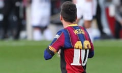 Lionel Messi wears a Newell’s Old Boys shirt in memory of Diego Armando after scoring in Barcelona’s thumping win against Osasuna.
