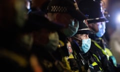 Police officers wearing face masks