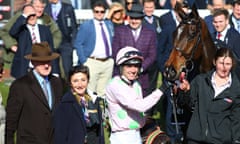 Willie Mullins, left, with Douvan after victory for the horse at the Cheltenham Festival.