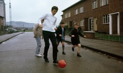 Outnumbered … George Best takes on the locals near his old home on the Cregagh Estate, in the late 1960s.