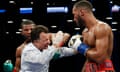 Referee Arthur Mercante Jr is hit by Badou Jack during the IBF and WBC World Super Middleweight title fight between James DeGale and Badou Jack.