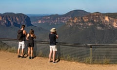 Tourists looking at the views across the Grose Valley at Govetts Leap Lookout, Blackheath