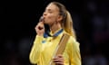 Ukraine's Olha Kharlan kisses her bronze medal.