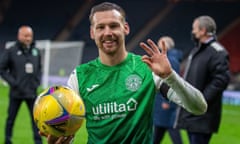 Martin Boyle celebrates with the match ball after Hibernian defeated Rangers.