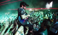 Latitude Festival, Suffolk, Britain - 21 Jul 2013<br>Mandatory Credit: Photo by London News Pictures/REX (2689591b)
Foals - Yannis Philippakis
Latitude Festival, Suffolk, Britain - 21 Jul 2013
Yannis Philippakis jumps in to the crowd with his guitar. Foals play at the Obelisk Arena as the closing act on the festival's main stage.