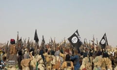 Islamic State fighters celebrate in May 2019 after an ambush on an army patrol, in the western Tillabéri region of Niger, that killed at least 28 troops.