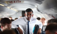 Rishi Sunak speaks to journalists on a plane last week