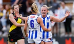 AFLW Semi Final 1 - Richmond v North Melbourne<br>MELBOURNE, AUSTRALIA - NOVEMBER 12: Alice O'Loughlin of the Kangaroos celebrates a goal with Vikki Wall of the Kangaroos during the 2022 S7 AFLW First Semi Final match between the Richmond Tigers and the North Melbourne Kangaroos at Swinburne Centre on November 12, 2022 in Melbourne, Australia. (Photo by Dylan Burns/AFL Photos via Getty Images)