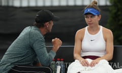 Simona Halep talks with her former coach Darren Cahill during a match in 2020. Halep has tested positive for the banned substance Roxadustat.
